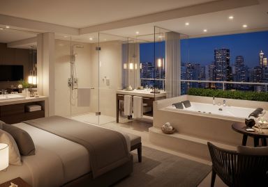 Suíte Luxo com cama king size e vista para a natureza